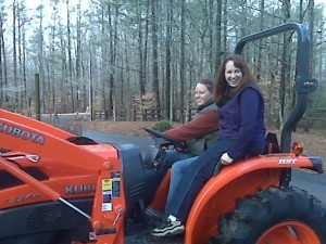 Ashley and Brandy on the new tractor